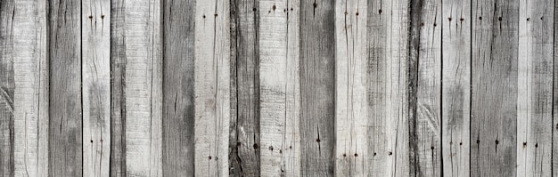As pranchas cinzentas rústicas de madeira texturizam o fundo vertical