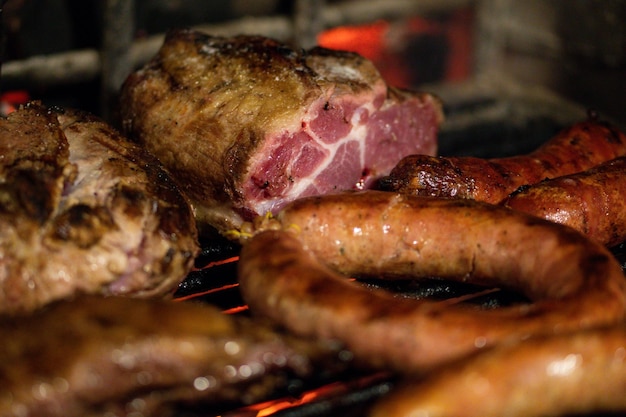 Foto asado y chorizos