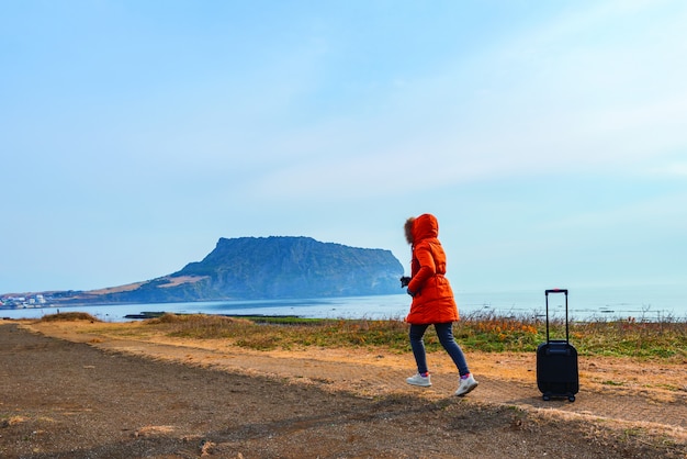 Asiatinreise am seongsan ilchulbong in Jeju-Insel, Südkorea