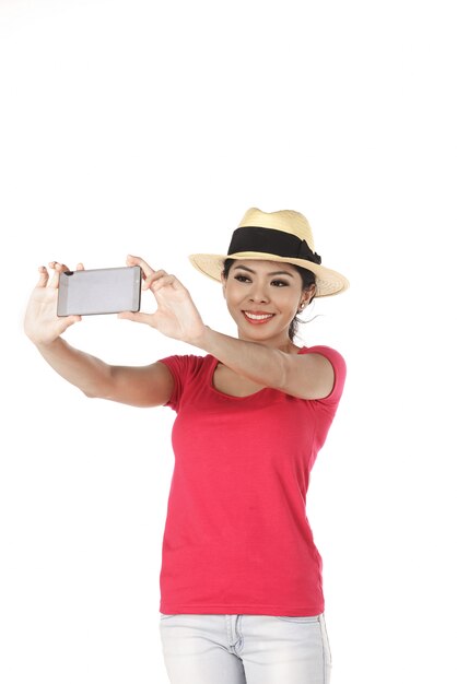 Asiatische Frau, die selfie tut