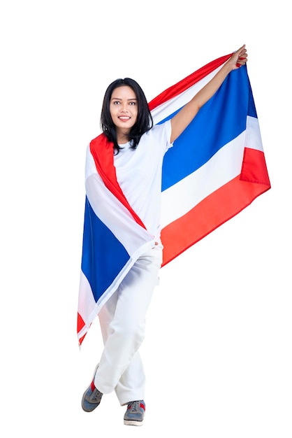 Asiatische Frauen feiern den Unabhängigkeitstag Thailands am 5. Dezember, indem sie die thailändische Flagge halten