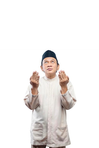 Asiatischer muslimischer Mann hob seine Hände und betete