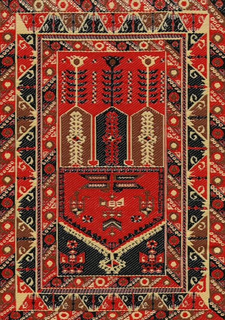Asiatischer und nahöstlicher traditioneller Stoffdesign-Teppich-Dekorationshintergrund