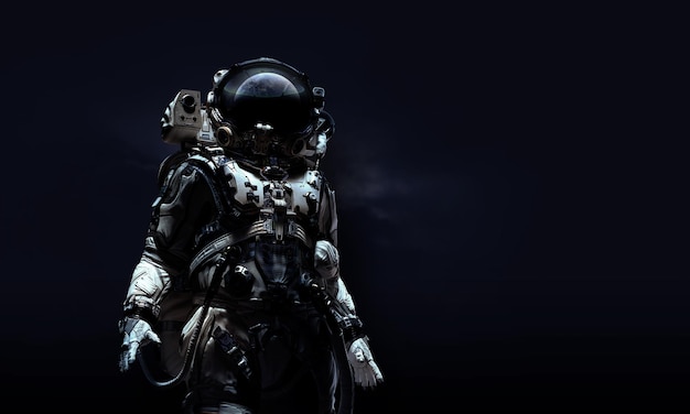 Astronauta en traje contra fondo negro. Concepto de tecnología espacial