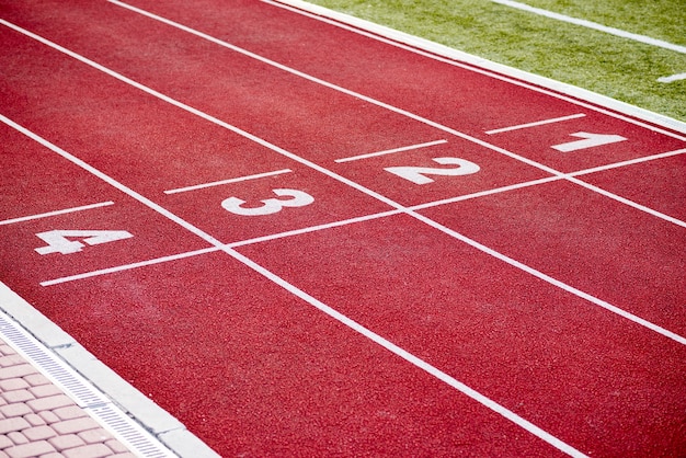 Foto atletismo pista carril números rojo pista