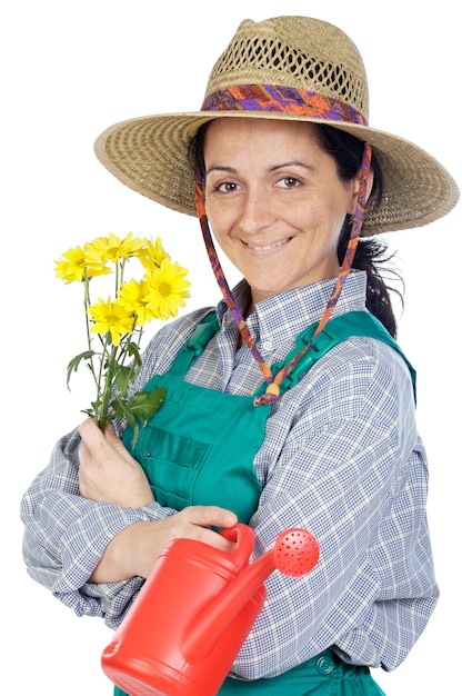 Atraente feliz mulher vestida de jardineiro