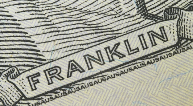 Aufschrift franklin super closeup auf der banknote von hundert us-dollar einer neuen probe