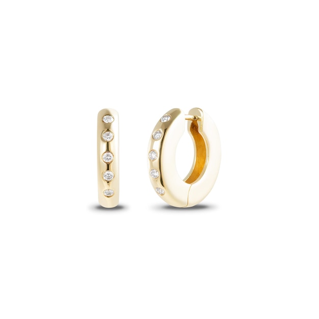 Auriculares de piedras preciosas de oro amarillo aislados en blanco Vista lateral delantera en pinzas de oído de lujo