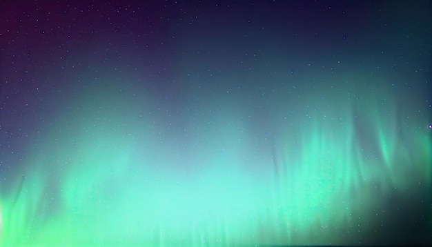 Una aurora boreal verde y azul con la luz encendida.