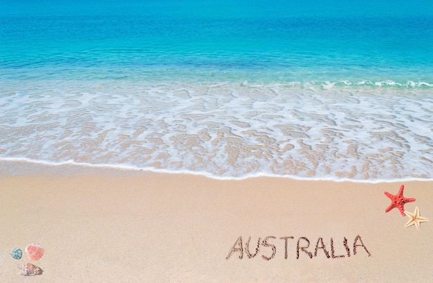 Foto australien geschrieben an einem tropischen strand