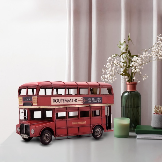 Foto autobús londinense clásico vintage rojo en la mesa