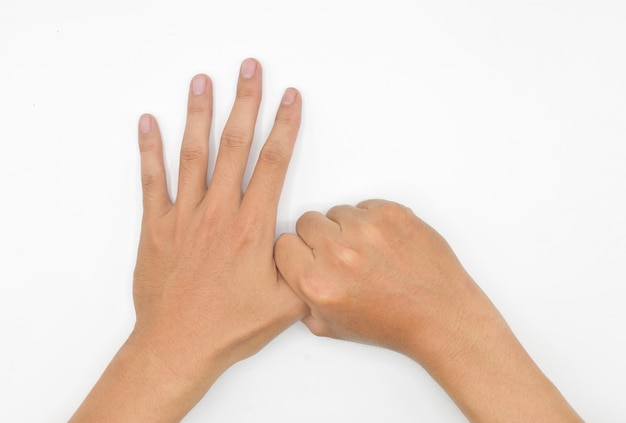 Automassagem nas mãos de um jovem asiático Dedos e saúde das articulações das mãos