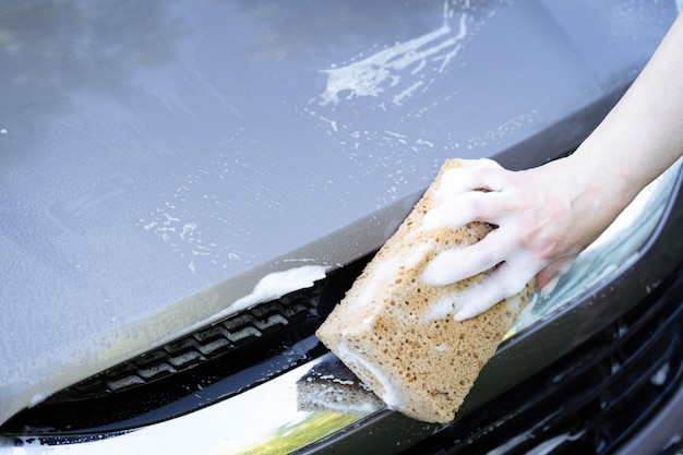 Foto autowäsche autopflege sommerautowäsche reinigung des autos mit wasser