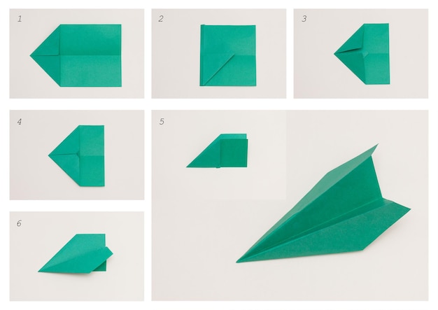 Avião de papel, origami. Conceito de DIY. Brinquedo artesanal passo a passo.