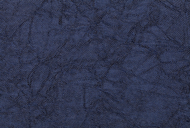 Azul oscuro ondulado un material textil. Tejido con textura natural de clousup.