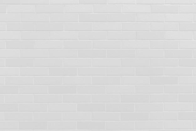 Azulejo de patrón de pared de ladrillo blanco limpio para fondo de construcción interior