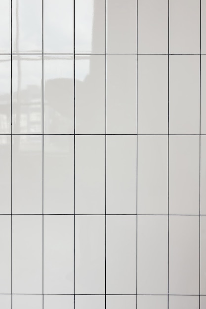 Foto azulejos de cerámica rectangular vertical brillante blanco textura de patrón sin costuras interior del baño y la pared de la cocina textura de repetición