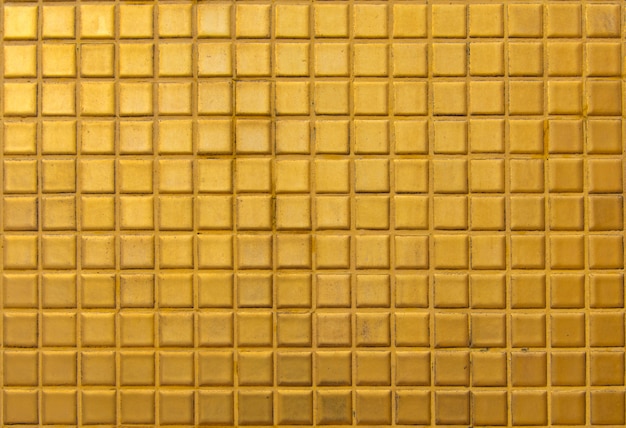 Foto azulejos de oro para el fondo de la textura