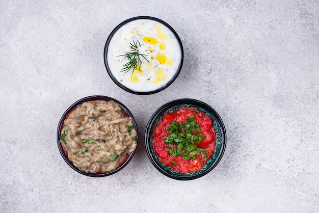 Baba ganoush, tzatziki y ezme de tomate