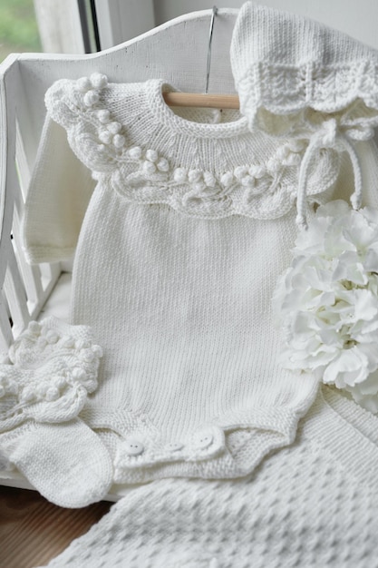 Baby gestrickte Kleidung und Accessoires Baby-Dusche-Party Taufkleid