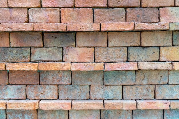 Backsteinmauer für Hintergrund oder Hintergrundtapete für die Fotografie