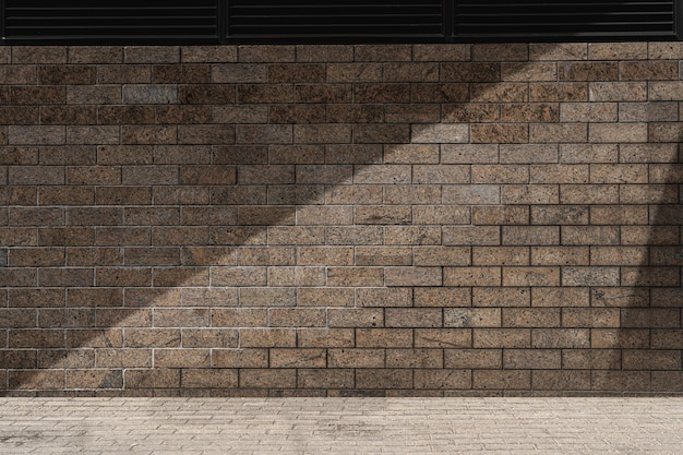 Backsteinmauer mit Lüftungsgittern als einzigartiger Designhintergrund