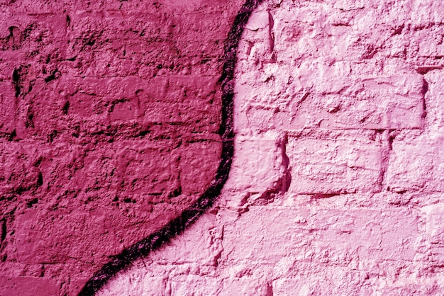 Backsteinmauer rot und rosa gestrichen. Hintergrundtextur.