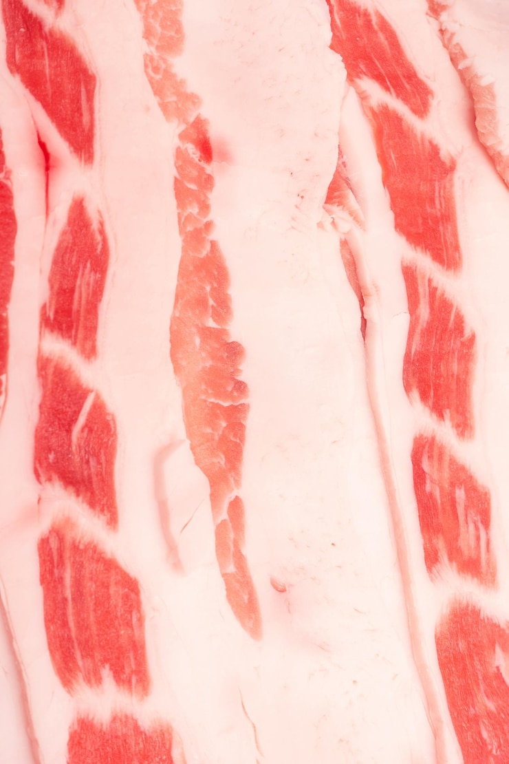 Foto bacon cru saboroso como fundo