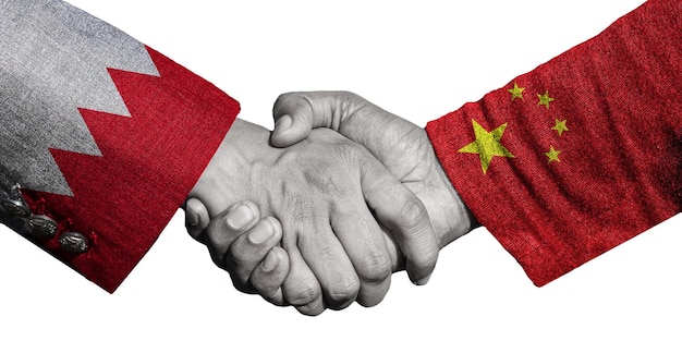 Bahrain und China freundschaftliche Handschüttelung als Zeichen der Zusammenarbeit und Freundschaft