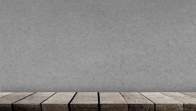 Balcão de mesa de prateleira de placa de madeira vazio com display cinza vazio com espaço de cópia para o pano de fundo de publicidade e plano de fundo com fundo de parede de papel cinza,
