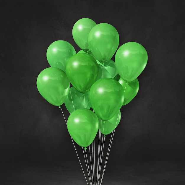 Foto balões verdes amontoados em uma parede preta