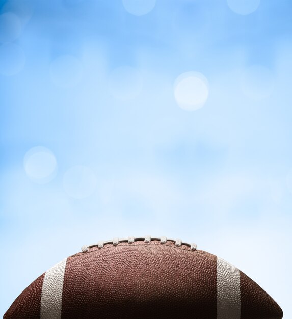 Foto balón de fútbol americano en el fondo