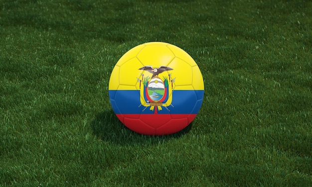 Balón de fútbol con los colores de la bandera de Ecuador en un estadio sobre fondo de pastos verdes