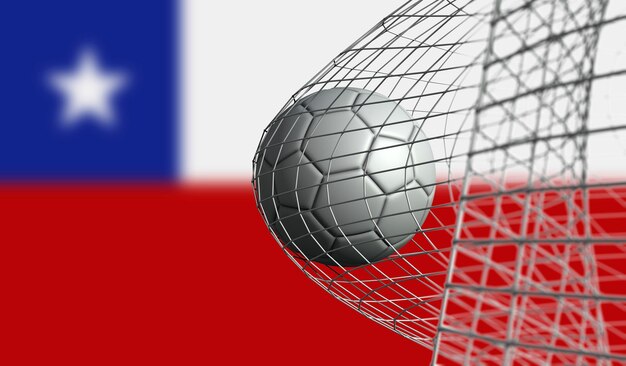 Foto balón de fútbol marca un gol en una red contra la bandera de chile 3d rendering