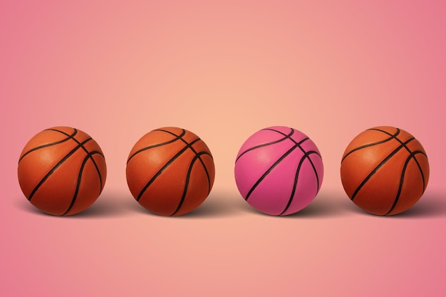 Balones de baloncesto sobre un fondo rosa Baloncesto rosa Concepto deportivo mínimo