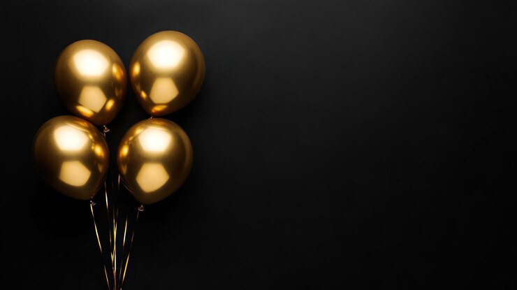 Balones dorados sobre un fondo negro