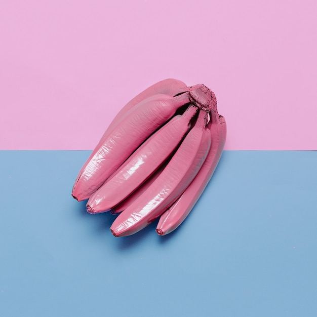 Bananen in rosa Farbe. Kunstgalerie Minimales Design kreativ surreal