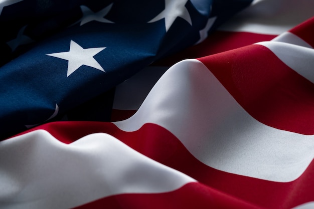 Foto bandeira americana ondulada tremulando ao vento