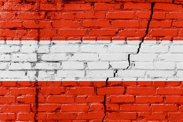 Bandeira austríaca pintada em uma velha parede de tijolos