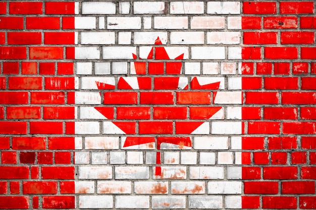 Bandeira canadense em um fundo de tijolos grunge