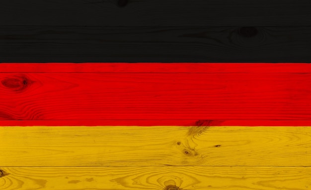 Foto bandeira da alemanha desenho de bandeira em tábua de madeira negócios de arte e conceito patriótico renderização 3d