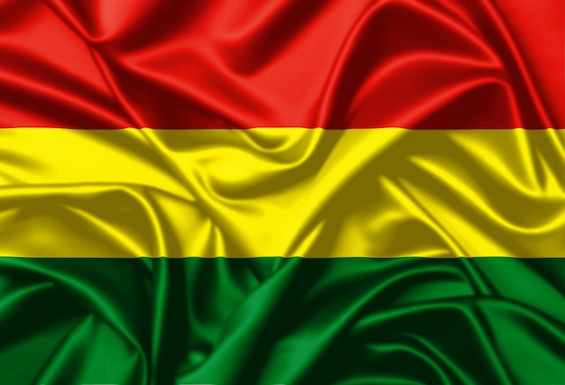 Bandeira da Bolívia agitando fundo de textura de cetim de perto
