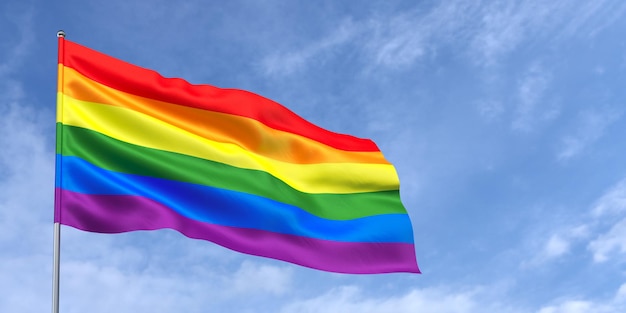 Bandeira da comunidade lgbt no mastro da bandeira no fundo do céu azul bandeira do arco-íris tremulando ao vento em um fundo de céu com nuvens lugar para ilustração 3d de texto