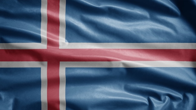 Foto bandeira da islândia balançando ao vento. bandeira da islândia soprada, seda macia e suave