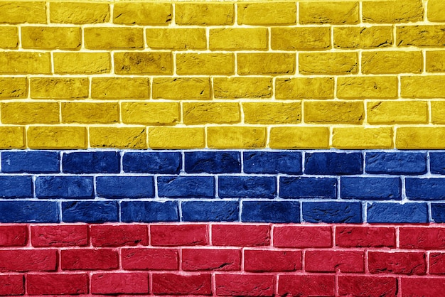 Foto bandeira da república da colômbia em um fundo texturizado colagem conceitual
