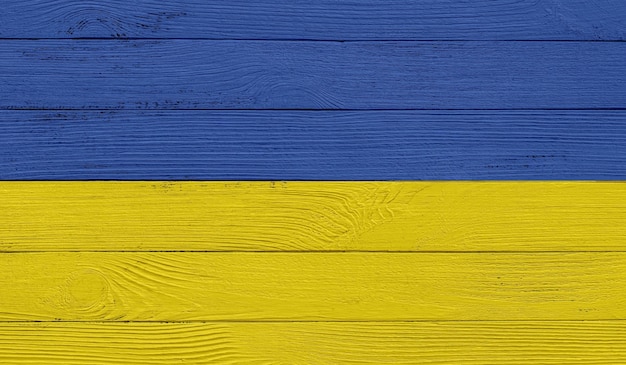 Bandeira da Ucrânia em uma textura de madeira Pranchas de textura de madeira Bandeira de fundo de textura de madeira Bandeira pintada