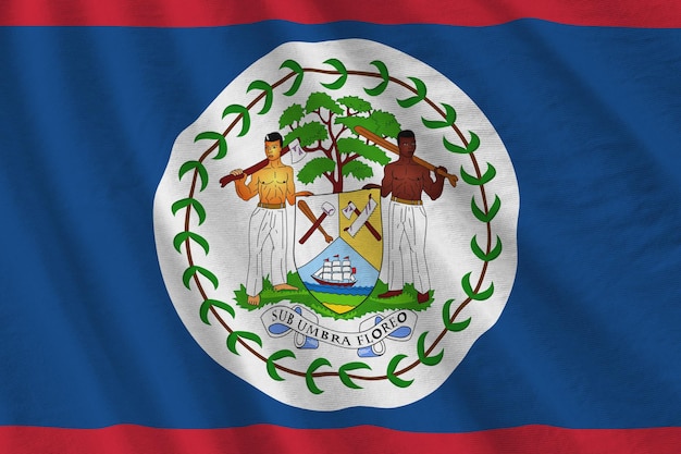 Bandeira de Belize com grandes dobras acenando sob a luz do estúdio dentro de casa Os símbolos e cores oficiais no banner