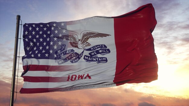 Bandeira de Iowa e EUA no mastro da bandeira. Bandeira mista dos EUA e Iowa balançando ao vento