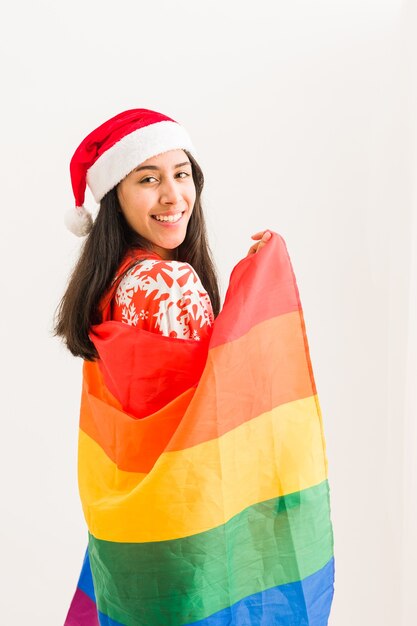 Bandeira de natal lgbtq arco-íris celebração feliz lésbica latina jovem