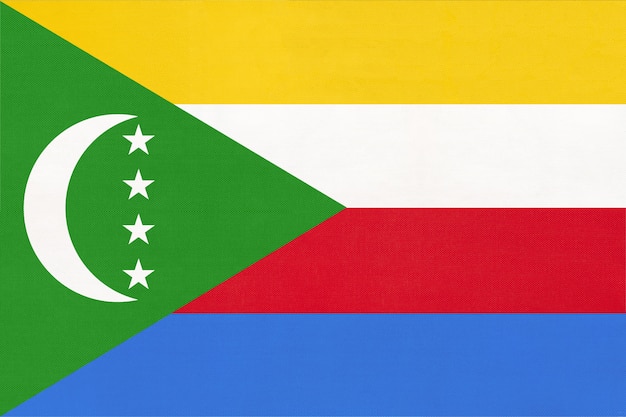 Bandeira de tecido nacional ilha Comores, fundo de têxteis. Símbolo do país africano do mundo internacional.